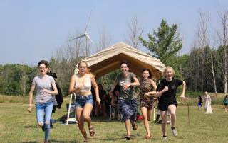 Group of campers running